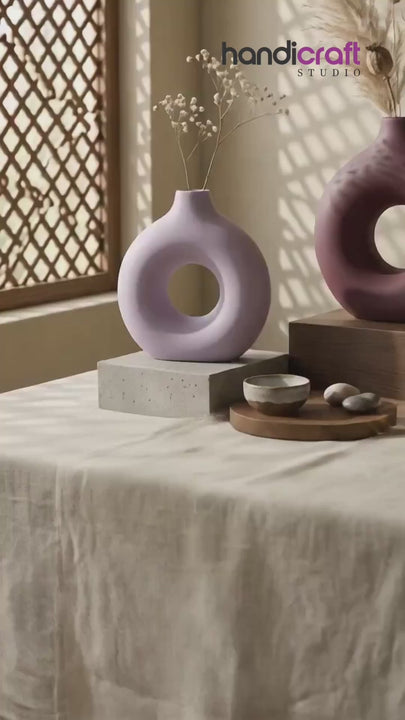 Donut ceramic vase in an earthy shade set within a boho and rustic themed room