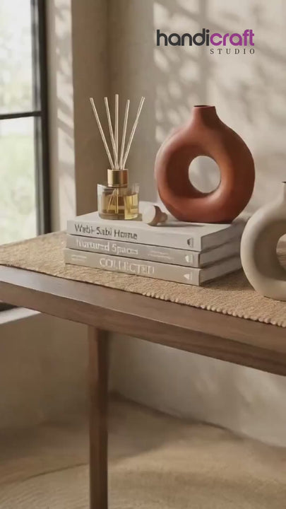 Ceramic donut vase made from earthy river clay wrapped as a thoughtful gift